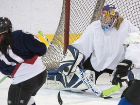 Annie Desrosiers makes a save against Pointe Claire's Catherine So.