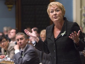 Quebec Premier Pauline Marois gestures during question period at the Quebec legislature, Wednesday February 13, 2013. The week this picture was taken, Quebecers were telling an online poll that their honeymoon with the PQ is over. THE CANADIAN PRESS/Clement Allard