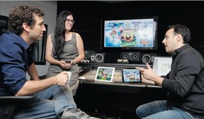 David Lipes, left, Noémi Dupuy, and Michael Elman co-founded Budge Studios in 2010. Allen McInnis/ The Gazette