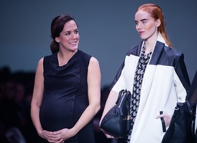 Target Emerging Designer winner Mélissa Nepton on the catwalk at Montreal Fashion Week with one of her models. PHOTO, DARIO AYALA, THE GAZETTE