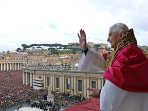 A file picture taken on April 19, 2005 and released by the Osservatore Romano shows Pope Benedict XVI, Cardinal Joseph Ratzinger of Germany, waving from a balcony of St Peter's Basilica in the Vatican after being elected by the conclave of cardinals.Pope Benedict XVI announced on February 11, 2013 he will resign on February 28 because his age prevented him from carrying out his duties, an unprecedented move in the modern history of the Catholic Church.
AFP PHOTO / OSSERVATORE ROMANO ARTURO MARI/AFP/Getty Images