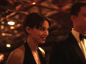 Emily (Rooney Mara) and husband Martin (Channing Tatum) at a party, in the Steven Soderbergh film Side Effects. They were living a golden life before he was sent to prison for insider trading. Martin has promised Emily that he will "get them back to where they were." Seville/EntertainmentOne.