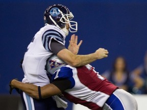 This is what John Bowman does best - kill the quarterback. This time, it's Toronto's Ricky Ray.

Allen McInnis/The Gazette