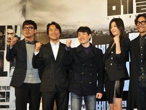South Korean director Ryoo Seung-Wan (C) poses with actors Ha Jung-Woo (L), Han Suk-Kyu (2nd L), Ryoo Seung-Beom (R) and actress Jun Ji-Hyun (2nd R) during a press conference to promote their film "The Berlin File" in Seoul on January 21, 2013. The Berlin File is about secret agents from South and North Korea who target each other in Berlin.          (JUNG YEON-JE/AFP/Getty Images)