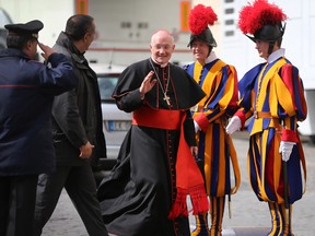 VATICAN CITY, VATICAN - Canadian Cardinal Marc Ouellet leaves after attending the final congregation before electing a new Pope. Cardinals are set to enter the conclave on Tuesday to elect a successor to Pope Benedict XVI after he became the first pope in 600 years to resign from the role. The will be held inside the Sistine Chapel and attended by 115 cardinals as they vote to select the 266th Pope of the Catholic Church.  (Photo by Joe Raedle/Getty Images)