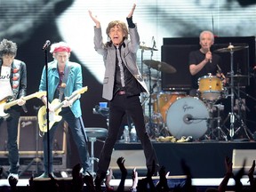 The Rolling Stones, from left, Ronnie Wood, Keith Richards, Mick Jagger and Charlie Watts perform live at the Prudential Center in Newark, NJ on Saturday, Dec. 15, 2012. (Photo by Evan Agostini/Invision/AP) ORG XMIT: NYEA123