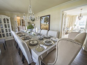 BEACONSFIELD, QC: NOVEMBER 8, 2012 -- Dining room, with light-painted sideboard and table set for dinner. Story is for urban expressions magazine. homeowner Paulina Flores Rutenberg is a Beaconsfield mom and interior designer on November 8, 2012. (Rogerio Barbosa / THE GAZETTE)