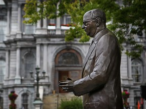 A statue of former mayor Jean Drapeau stands in a square across from Montreal City Hall, a constant reminder to his successors of the rewards and pitfalls of thinking big. That said, it would have been hard to find a provincial politician who would have dared criticized Monsieur Le Maire the way this city's mayors are being criticized today. (John Mahoney/THE GAZETTE)