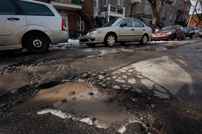 Stymied by a vote on city council this week to buy asphalt to plug the city's potholes, Mayor Michael Applebaum has decided to conduct an online survey of Montrealers to determine which is more important - not giving public money to companies alleged before the Charbonneau inquiry to have engaged in questionable practices,  or patch the city's streets. (Dario Ayala/THE GAZETTE)