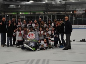 The bantam B-F Royals celebrate their win.