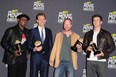 Actors Samuel L. Jackson and Tom Hiddleston, director Joss Whedon, and actor Chris Evans, winners of Movie of the Year for Marvel's The Avengers, pose in the press room at the 2013 MTV Movie Awards on April 14, 2013 in Culver City, California.  (Jason Merritt/Getty Images)