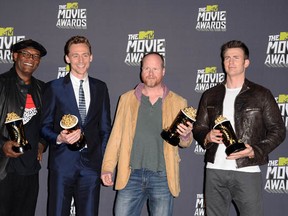 Actors Samuel L. Jackson and Tom Hiddleston, director Joss Whedon, and actor Chris Evans, winners of Movie of the Year for Marvel's The Avengers, pose in the press room at the 2013 MTV Movie Awards on April 14, 2013 in Culver City, California.  (Jason Merritt/Getty Images)