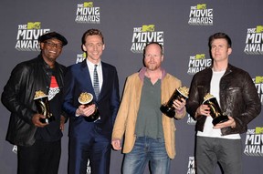 Actors Samuel L. Jackson and Tom Hiddleston, director Joss Whedon, and actor Chris Evans, winners of Movie of the Year for Marvel's The Avengers, pose in the press room at the 2013 MTV Movie Awards on April 14, 2013 in Culver City, California.  (Jason Merritt/Getty Images)