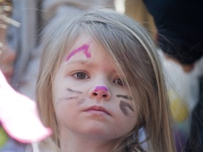 Four-year-old Madeline Vilon got her face painted with Easter colours at the annual Easter egg hunt in Hudson Saturday.