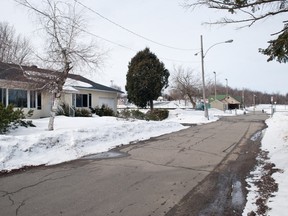 MONTREAL, QC March 16, 2013 --  One story bungalow at 1548 rue Poirier, St Lazarre, Quebec as viewed looking North-west. Parc Bedard and the St Lazare Tennis courts are north to the right. (Frederic Hore/THE GAZETTE) ORG XMIT: 46207