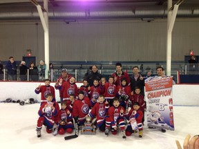 The Lakeshore Novice B Tigers take the title. Coach Murray Humphries is pictured back row, third from right. Photo courtesy of Robert Barakett