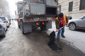 As Montreal council prepares to vote on Friday whether to award a $5 million contract for the provision of asphalt to a collection of firms that includes companies named before the Charbonneau inquiry, Vision Montreal is arguing that the city should consider making its own asphalt. The city will be completely out of the essential pothole patching material as of April 15. (John Kenney/THE GAZETTE)