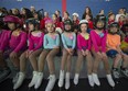 Members of the Canskate program watch as other skater perform.