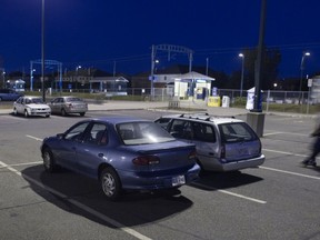 Sunnybrooke commuter train station parking lot at night. Residents complain there are not enough spots for commuters during the day.