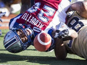 Running-back Victor Anderson, seen here committing a fumble, has been released by the Alouettes.
Dario Ayala/The Gazette