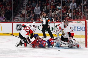 Max Pacioretty of the Montreal Canadiens falls to the ice as Eric Gryba of the Ottawa Senators and goalie Craig Anderson defend in Game Five of the Eastern Conference Quarterfinals during the 2013 NHL Stanley Cup Playoffs at the Bell Centre. The Habs beat Anderson once, but saw the Senators score six times to eliminate them from the playoffs (Photo by Francois Laplante/Freestyle Photo/Getty Images)