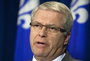 Coalition Avenir Québec MNA Daniel Ratthé responds to reporters' questions at a news conference last February. The CAQ has suspended Ratthe amid allegations of illegal financing while he was in municipal politics. CAQ leader Francois Legault says he has suspended Ratthe after being told the allegations would be raised before the Charbonneau Commission looking into corruption in Quebec's construction industry. THE CANADIAN PRESS/Jacques Boissinot