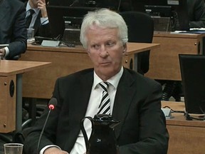 Former construction executive Gilles Theberge testifies at Quebec's corruption inquiry. Theberge told the commission that soon after ignoring a request to back off seeking a lucrative contract in St. Laurent, his car was blown up as it sat in his driveway. THE CANADIAN PRESS/HO-Charbonneau Commission