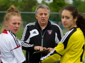 John Theodosopoulos on the sidelines during a game on Sunday, May 26, 2013.