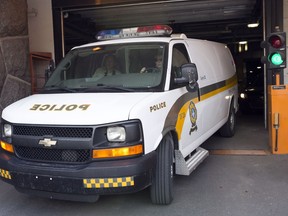 A police van carrying ex-Laval mayor Gilles Vaillancourt leaves provincial police headquarters and heads for the Laval courthouse. Vaillancourt was arrested on charges of corruption and fraud.THE CANADIAN PRESS/Ryan Remiorz