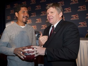 Als' head coach Dan Hawkins (right) found a unique manner in which to motivate veteran QB Anthony Calvillo this week.
Graham Hughes/Canadian Press