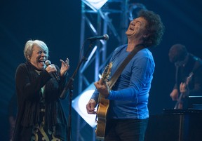 MONTREAL, QUE: JUNE 15, 2013 - Louise Forestier left, joins legendary Quebec singer-songwriter Robert Charlebois on stage to sing Lindberg at Place des Arts in Montreal  Montreal, Saturday, June 15, 2013. (Peter McCabe / THE GAZETTE) ORG XMIT: 47054