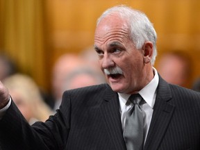 Minister of Public Safety Vic Toews told Canadians last year if they didn't support invasive spying, then they were on the side of child predators. They didn't buy it. (CANADIAN PRESS/Sean Kilpatrick)