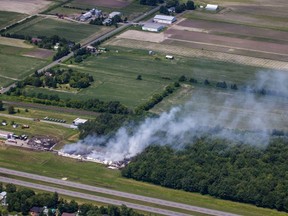 Smoke billows from the B.E.M. fireworks plant.