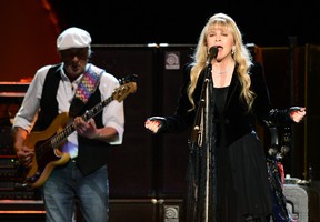 LAS VEGAS, NV - MAY 26:  Bassist John McVie (L) and singer Stevie Nicks of Fleetwood Mac perform at the MGM Grand Garden Arena on May 26, 2013 in Las Vegas, Nevada.  (Photo by Ethan Miller/Getty Images)