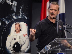 Canadian astronaut Chris Hadfield speaks at a news conference today where he announced his plans to retire from the Canadian Space Agency. THE CANADIAN PRESS/Paul Chiasson