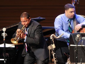 MONTREAL, QUE: JUNE 28, 2013 -- Wynton  Marsalis plays beside bassist Carlos Henriquez during his concert with the Jazz at Lincoln Centre Orchestra at the Maison Symphonique de Montreal as part of the Montreal International Jazz Festival Friday, June 28, 2013. (THE GAZETTE / John Kenney)