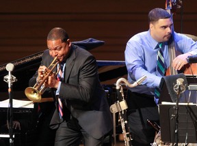 MONTREAL, QUE: JUNE 28, 2013 -- Wynton  Marsalis plays beside bassist Carlos Henriquez during his concert with the Jazz at Lincoln Centre Orchestra at the Maison Symphonique de Montreal as part of the Montreal International Jazz Festival Friday, June 28, 2013. (THE GAZETTE / John Kenney)