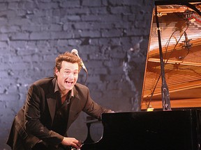 MONTREAL, QUE. : OCTOBER 20, 2011--Musician Michael Kaeshammer at the piano with his band performing at L'Astral  at the Maison du Festival de Jazz de Montreal on October 20, 2011. (Marie-France Coallier) / THE GAZETTE)