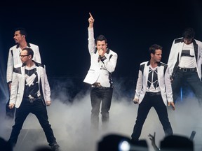 MONTREAL, QUE.: JUNE 6, 2013-- Donnie Wahlberg, front left, Joey McIntyre, front right, Jordan Knight, centre, Danny Wood, rear left, and Jonathan Knight, rear right, of the American pop group New Kids On The Block perform at the Bell Centre in Montreal on Thursday, June 6, 2013. (Dario Ayala / THE GAZETTE) ORG XMIT: 46958