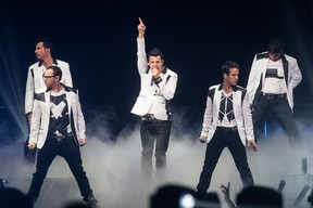 MONTREAL, QUE.: JUNE 6, 2013-- Donnie Wahlberg, front left, Joey McIntyre, front right, Jordan Knight, centre, Danny Wood, rear left, and Jonathan Knight, rear right, of the American pop group New Kids On The Block perform at the Bell Centre in Montreal on Thursday, June 6, 2013. (Dario Ayala / THE GAZETTE) ORG XMIT: 46958