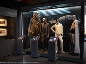 Chewbacca and Friends from the Star Wars Indentities exhibition at the Canada Aviation and Space Museum in Ottawa until September 2. From L to R) Chewbacca costume, Hans Solo costume worn by Harrison Ford, Princess Leia costume worn by Carrie Fisher and Lando Calrissian costume worn by Billy Dee Williams (Photo courtesy Lucasfilm Ltd. and X3 Productions)