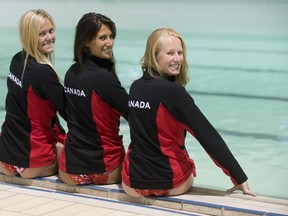 Katie McLeod, Camille Bowness and Janelle Ball sit poolside. (Graham Hughes/THE GAZETTE)