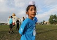 Gurtaj Singh, 7 takes part in a pick-up game last week next to the Gurdwara Guru Nanak Darbar temple in the Lasalle . The Quebec Soccer Federation announced today it is maintaining its ban on players wearing turbans and other Sikh head coverings. (THE GAZETTE / John Kenney)
