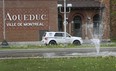 A vehicle from City of Montreal is seen in front of the Atwater filtration plant during last month's boil water alert, the biggest in the city's history. City officials said today the problems were caused in part by a faulty, 60-year-old shut-off valve.
(Marie-France Coallier/ THE GAZETTE)