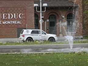 A vehicle from City of Montreal is seen in front of the Atwater filtration plant during last month's boil water alert, the biggest in the city's history. City officials said today the problems were caused in part by a faulty, 60-year-old shut-off valve.
(Marie-France Coallier/ THE GAZETTE)
