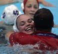 Canada's Christine Robinson hugs Ahmed El-Awadi, then, assistant coach, after Canada's bronze medal win over Russia at 2005 FINA championships in Montreal.