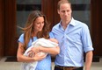 Prince William and Catherine, Duchess of Cambridge show their new-born baby boy to the world's media outside the Lindo Wing of St Mary's Hospital in London on July 23, 2013. The baby was born on Monday afternoon weighing eight pounds six ounces (3.8 kilogrammes). The baby, titled His Royal Highness, Prince of Cambridge, is directly in line to inherit the throne after Charles, Queen Elizabeth II's eldest son and heir, and his eldest son William.  He has yet to be given a name. AFP PHOTO / LEON NEALLEON NEAL/AFP/Getty Images