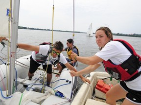 Laurence Chapdelaine Pilon on her motor boat during a sailing lesson at the Baie d'Urfe Yacht Club.