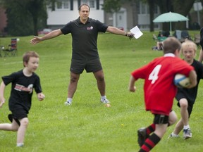 John Giannatsis on the sidelines during a recent game.