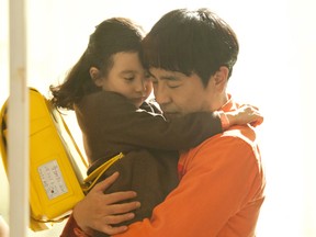 Gal So-won, (left) and Ryu Seung-ryong play daughter and father in the Korean film Miracle in Cell No. 7.